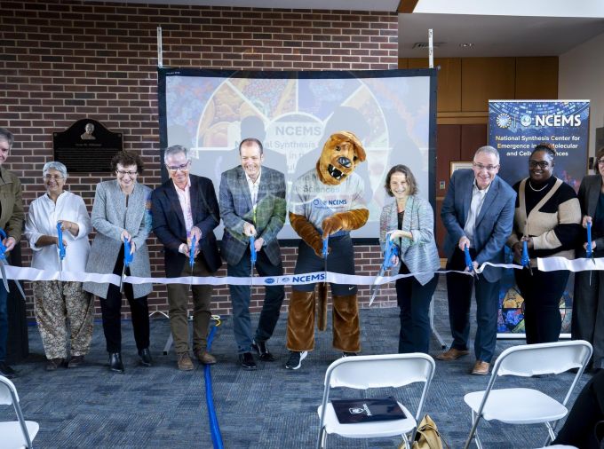 <p>Penn State and the U.S. National Science Foundation celebrated the official launch of the U.S. National Science Foundation National Synthesis Center for Emergence in the Molecular and Cellular Sciences with a ribbon cutting and ceremony at the Verne M. Willaman Gateway to the Life Sciences bridge in the Huck Institutes of the Life Sciences on Nov. 18. The event marked the physical dedication of the federally funded center, which was first announced in April.</p>