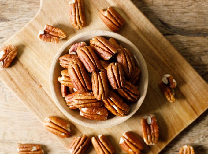 <p>Switching daily snack foods to pecans improves cholesterol levels and enhances overall diet quality, according to a new study by researchers in the Penn State Department of Nutritional Sciences.</p>